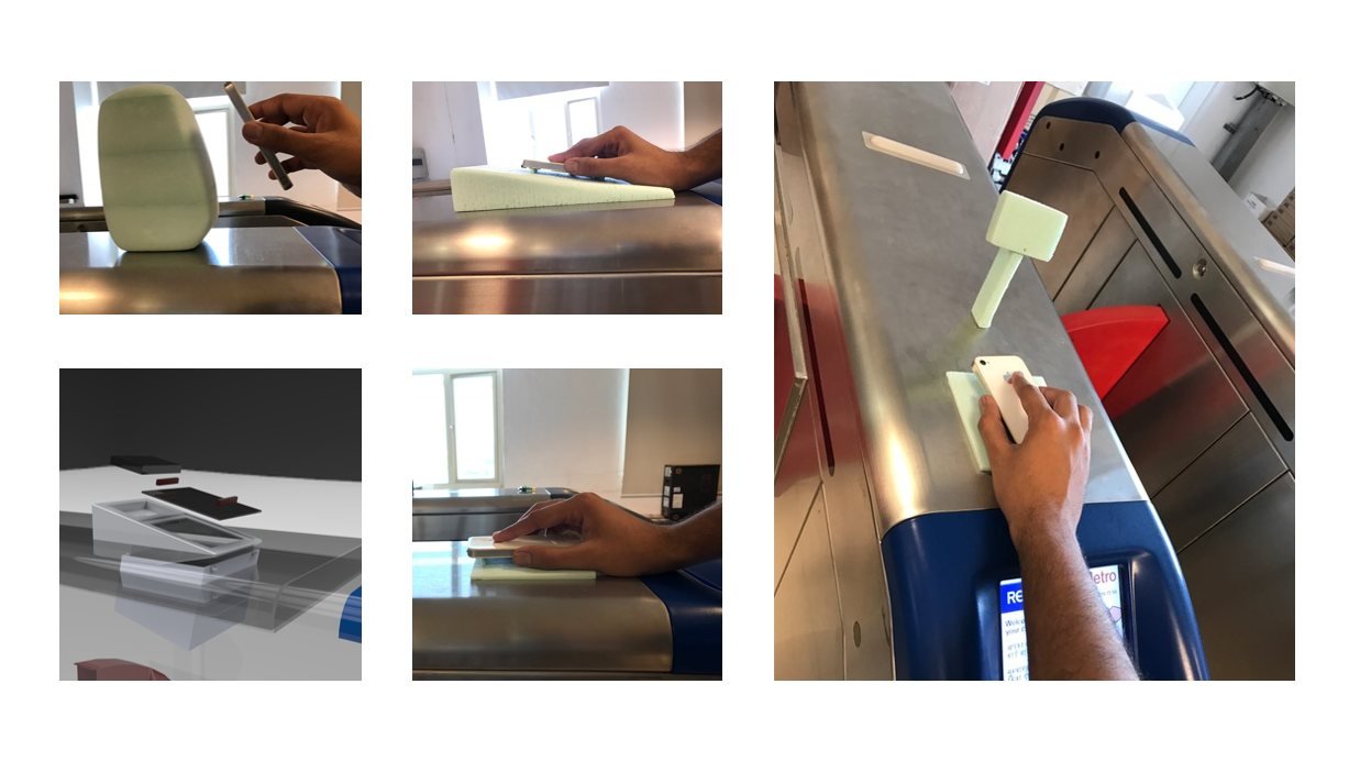 Foam mock-ups of the validator taped onto live AFC gates to check reach, angle and sightlines